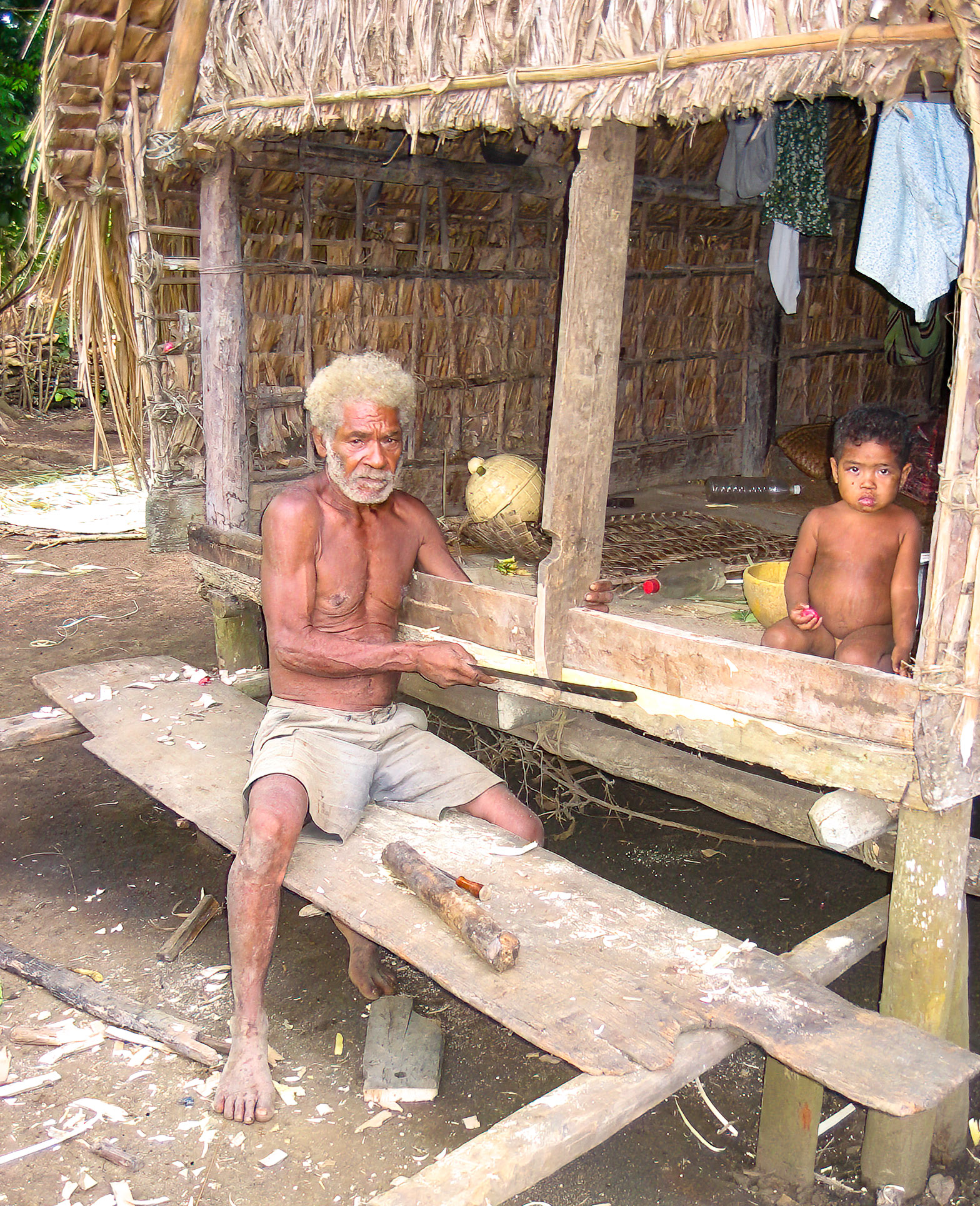 man working with machete